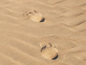 beach-sand-with-footprints